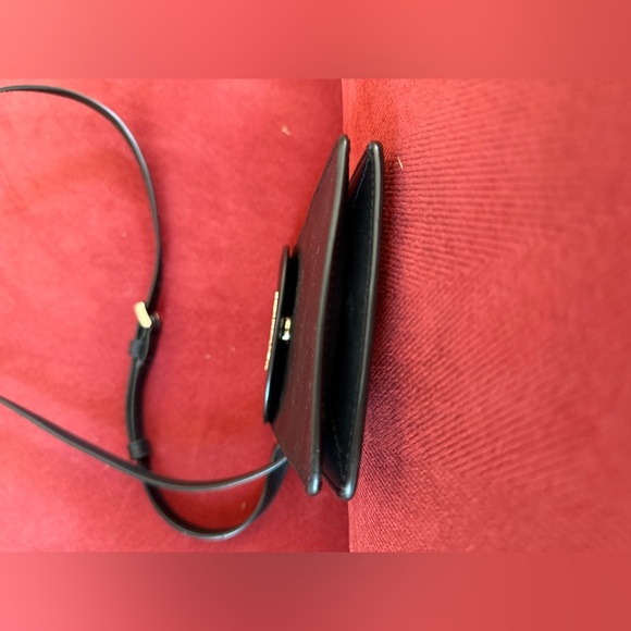 Kate Spade ns flap phone cross body purse. NWOT, black. Adjustable strap. - Picture 6 of 6